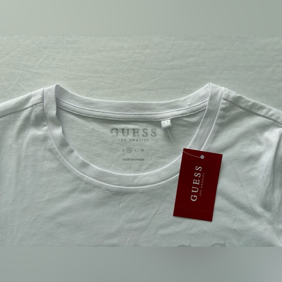 NWT-GUESS Pure White Short Sleeve Embossed Logo Tee - Picture 2 of 7